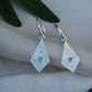 Terra Topaz Silver Celestial Earrings Huggies