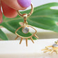 Gold Evil Eye Charm Huggies Earrings